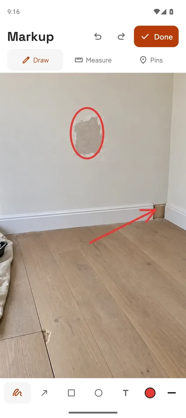 Drawpin markup screen: a plaster patch circled in red and an arrow pointing to missing skirting